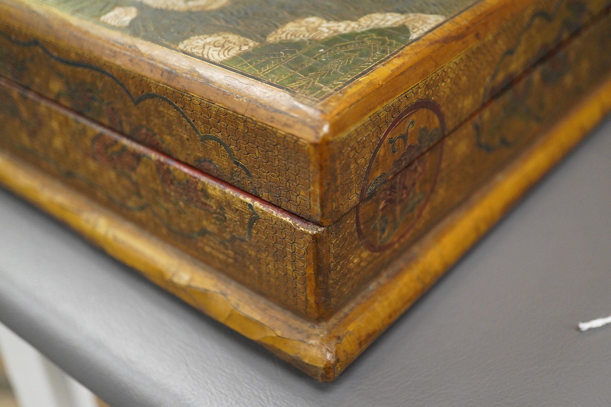 A Chinese inscribed polychrome lacquer document box, Qianlong mark and inscription